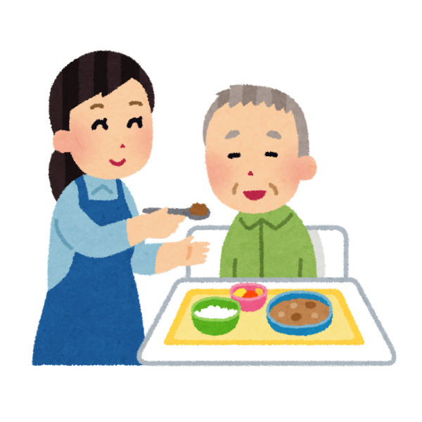 介護施設での職員さんと利用者の食事の場面。お互いが笑顔で声掛けし合っているのをイメージできるような画像
