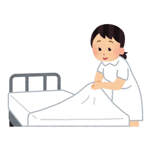 介護施設のベッドメイクをする職員のイメージ画像