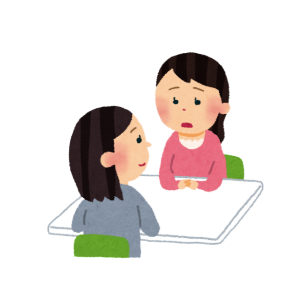 施設の職員に相談する家族のイメージ画像