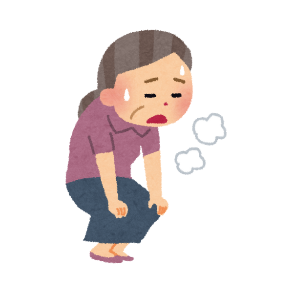 体力が落ちて息切れしている女性の画像